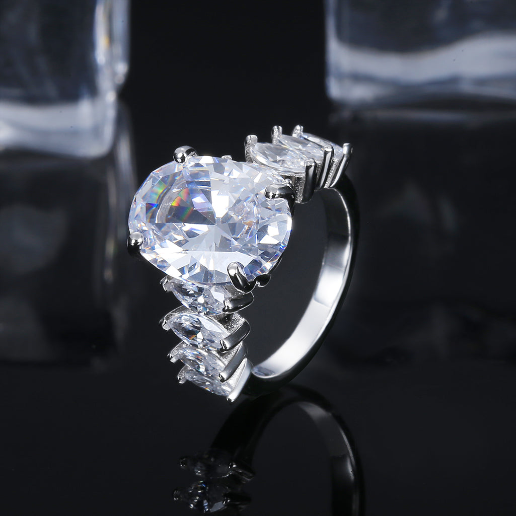 Brilliant Oval Cut with Marquise Shape Side Stones Ring